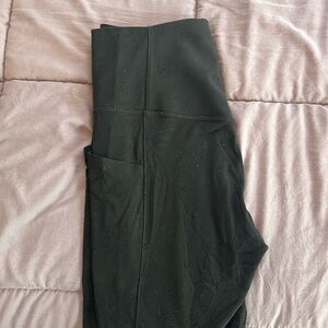 Athleta Leggings “ salutation stash pocket II tight” Size: Small in Black